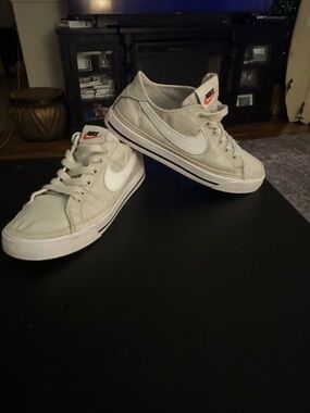 Nike Low-Top Sneakers in Beige and White with Orange Tongue Logo